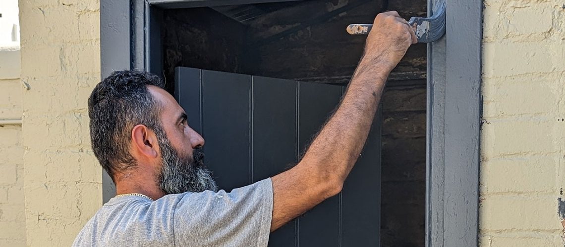 Painting a door without brush marks